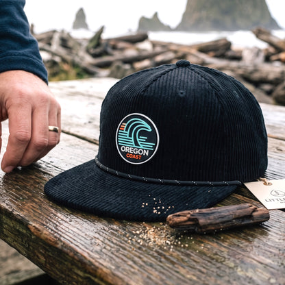 Oregon Coast Surf corduroy snapback hat featuring a two-tone design and ocean-inspired patch