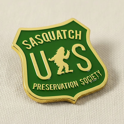 Sasquatch US Preservation Society badge on a beige background